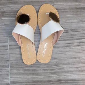 Brand new white sandals size 8 but run small would fit size 6.5